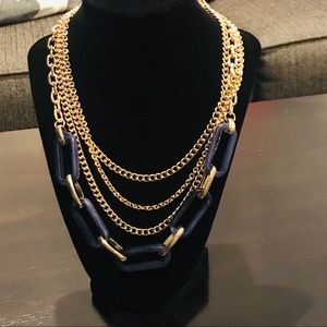 Never worn classy tiered necklace.